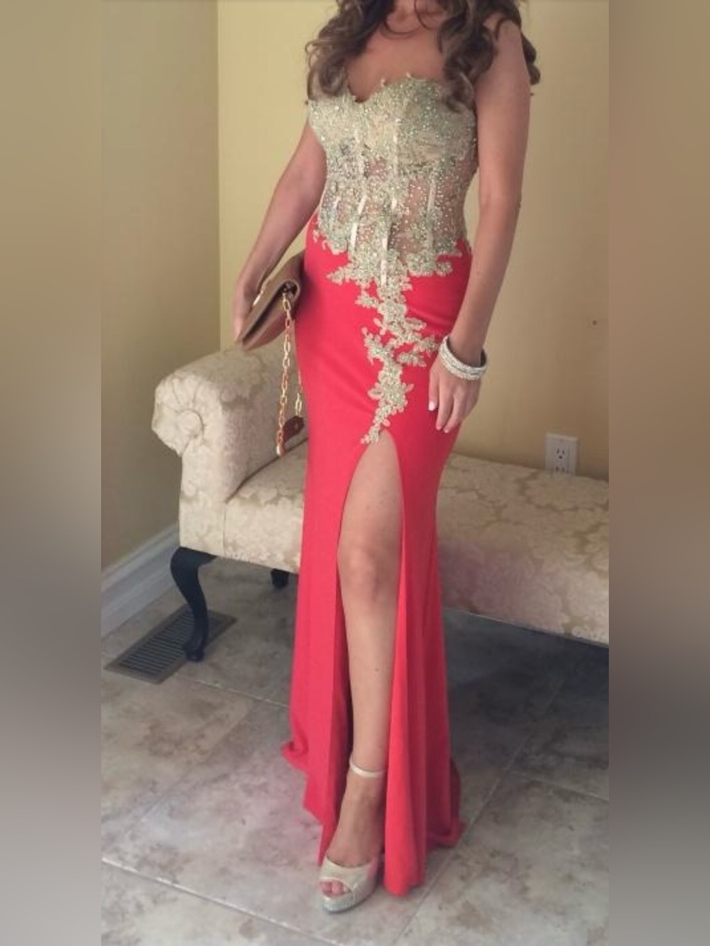 Elegant coral Evening Gown with Gold Embellished Bust